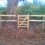 Creosoted post and rail and 2 new gates in Potterne