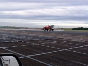 Treating moss and algae on a military airfield